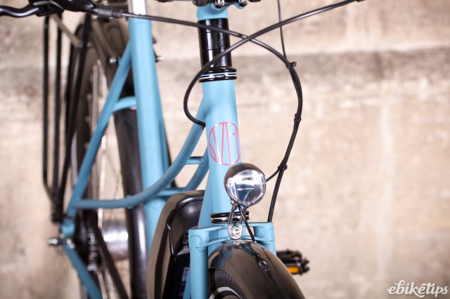 Sven Cycles The Swift Step Through e-bike - head tube badge and front light.jpg